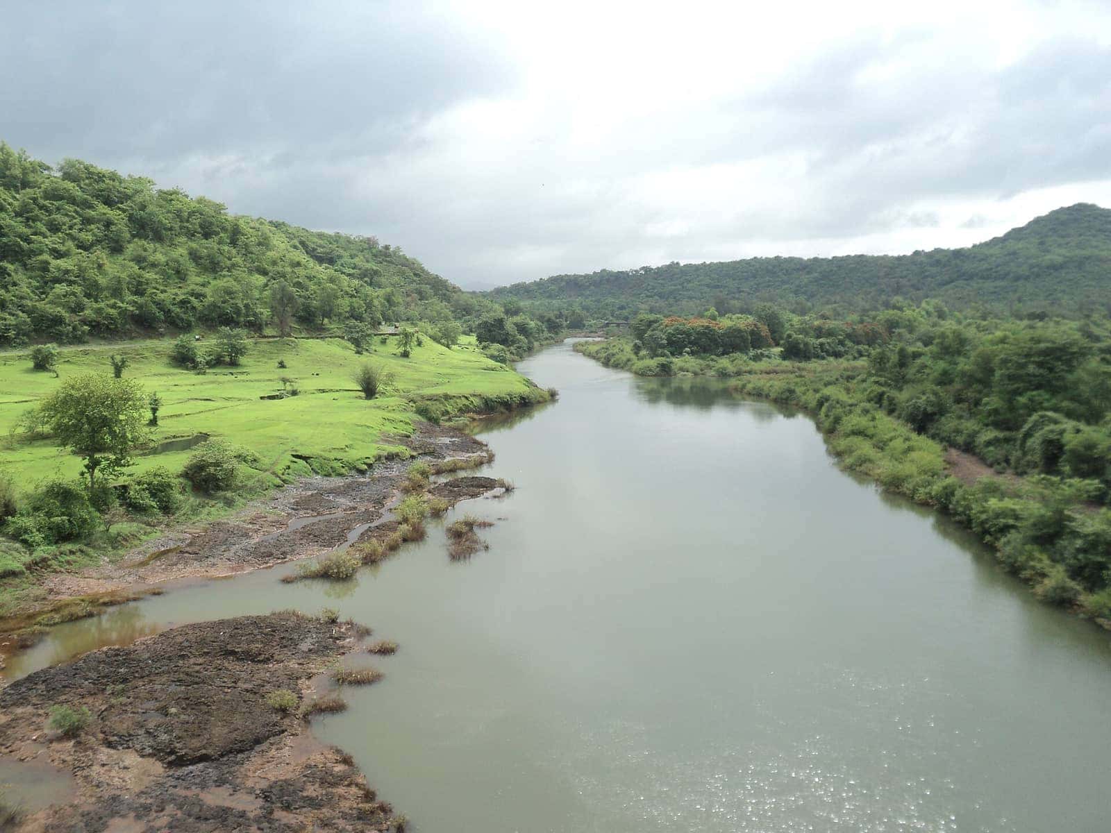 The Kali River winding between green hills in Uttara Kannada